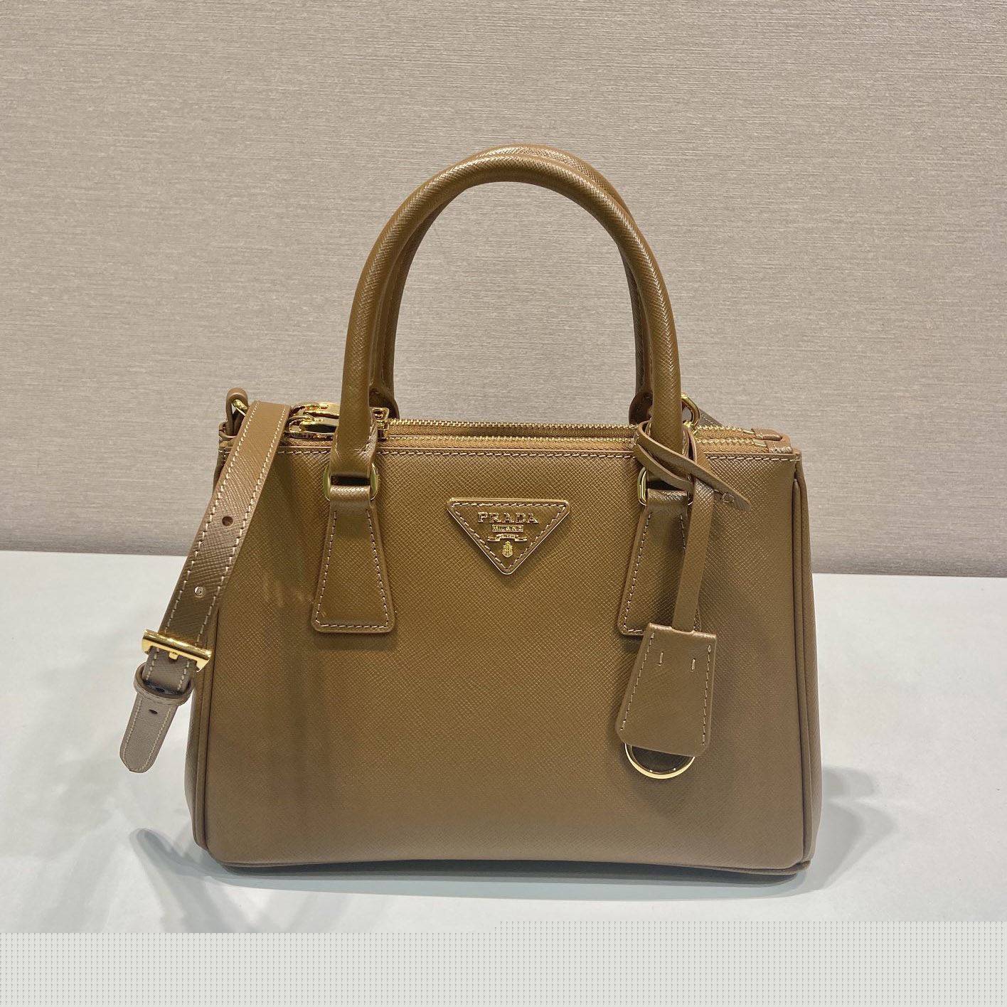 Pra*a top handle bags